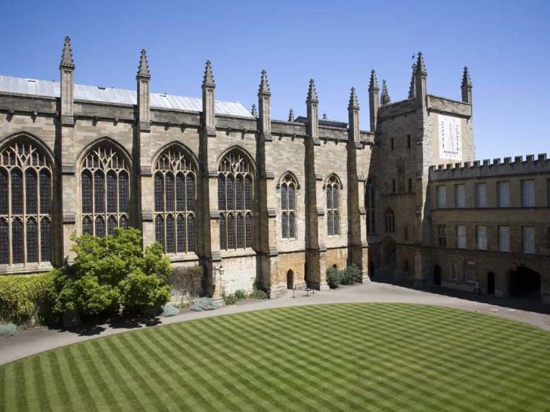 An Oxford college quadrangle with historic stone buildings